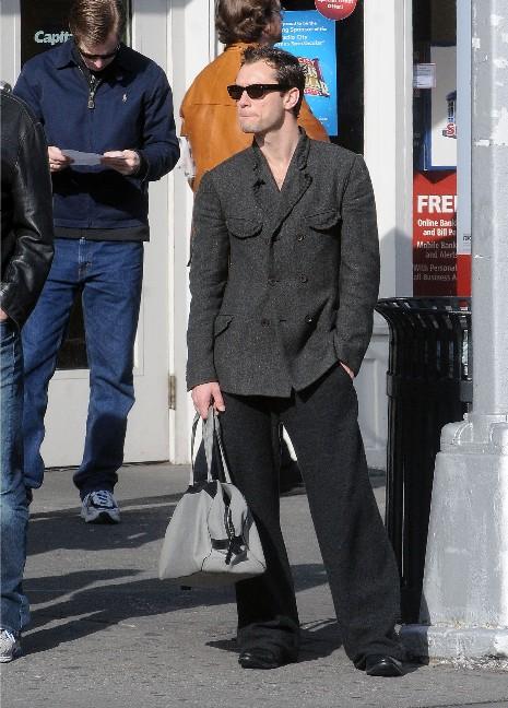 JUDE LAW WITH HIS HANDBAG: TO THINE OWN SELF BE TRUE