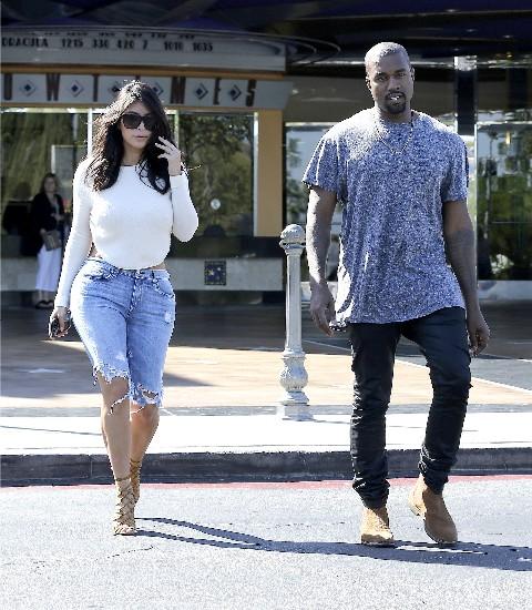 Kanye West Enjoys Watching Heads Turn As Kim Walks By